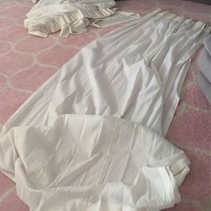 2 off white curtains